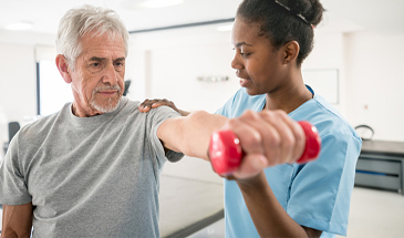 man with dumbbells